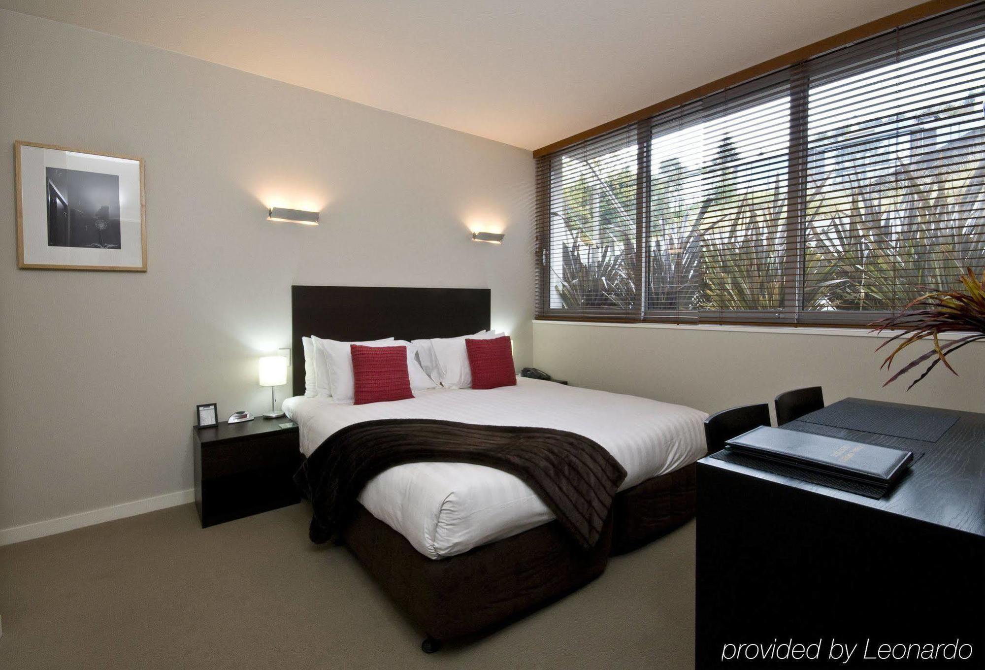 Swiss-Belsuites Pounamu Queenstown Room photo A bedroom at the hotel